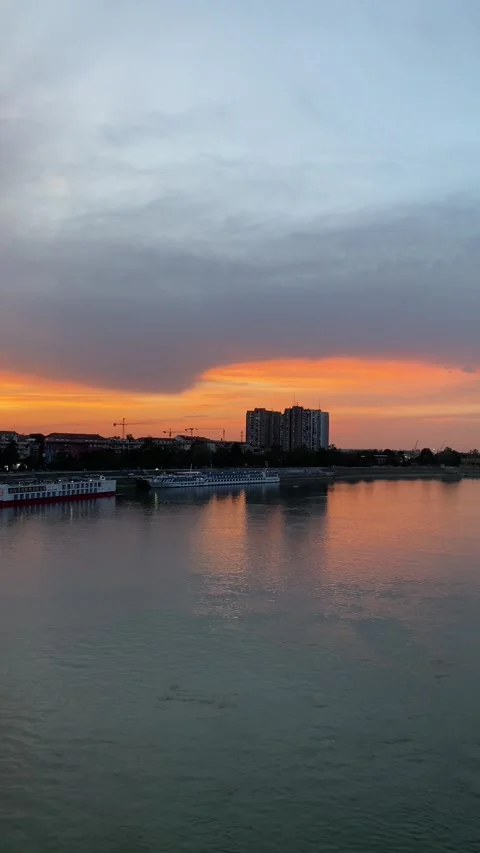Sunset over Danube River in Novi Sad, Serbia, changing colors, elevated view Stock Footage 339480191