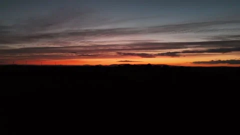 Sunset Over Dark Rural Landscape With Cloudy Sky 库存影片 333412279