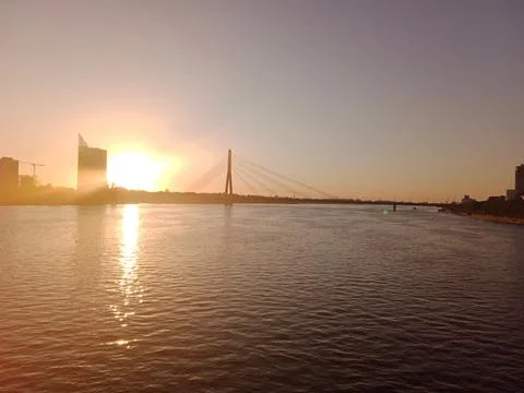 Sunset over the Daugava River and Cable-Stayed Bridge in Riga, Latvia Stock Photos