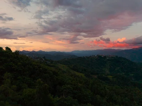 Sunset over dense forest from a drone in Northeast India Stock Footage