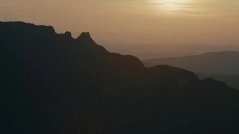 Sunset over Dent du Chat: A Majestic Silhouette in the French Alps Vidéo 284353030