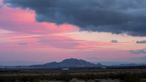 Sunset Over a Desert Landscape and Highway Video stock 90267237