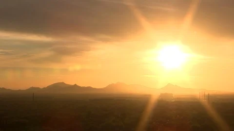 Sunset over desert landscape in Phoenix, AZ Stock Footage 99996490