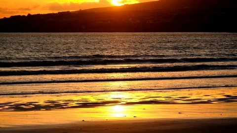 Sunset over deserted beach Video stock 79258124