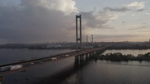 Sunset over the Dnieper river. South bridge. Peak hour. Aerial. Kyiv. Stock Footage 232004107