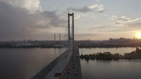 Sunset over the Dnieper river. South bridge. Peak hour. Aerial. Kyiv. Stock Footage 232004127