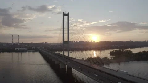 Sunset over the Dnieper river. South bridge. Peak hour. Aerial. Kyiv. Stock Footage 232004147