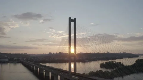 Sunset over the Dnieper river. South bridge. Peak hour. Aerial. Kyiv. Stock Footage 232004202