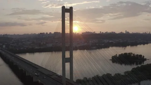 Sunset over the Dnieper river. South bridge. Peak hour. Aerial. Kyiv. Stock Footage 232004272