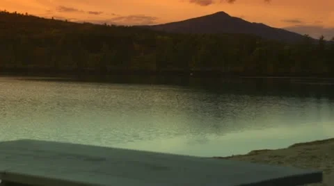 Sunset over Dock and Mountains Stock Footage 12320509