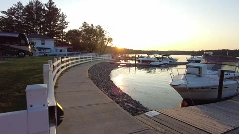 Sunset over docked boats Stock Footage 157559109