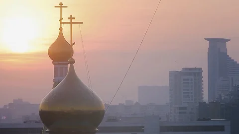 Sunset over the domes of the church Stock Footage 129683274