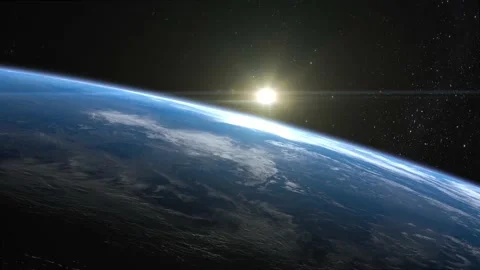 Sunset over the Earth. View from space. The camera rotates to the right. The Stock Footage 148498779