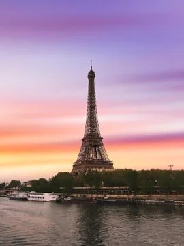 Sunset over the the Eiffel Tower and the Seine River in Paris, France. Stock Photos