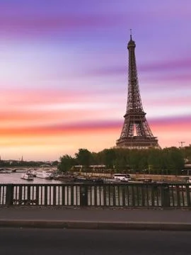 Sunset over the the Eiffel Tower and the Seine River in Paris, France. Stock Photos