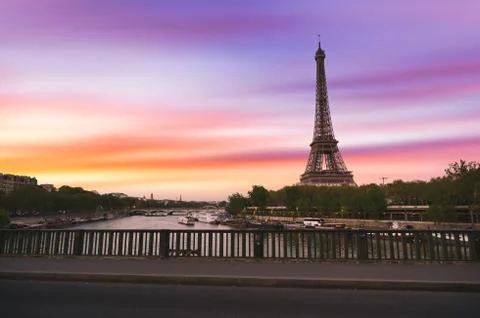 Sunset over the the Eiffel Tower and the Seine River in Paris, France. Stock Photos