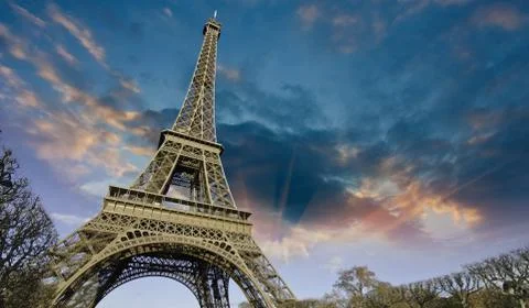 Sunset over Eiffel Tower from Champs de Mars Stock Photos
