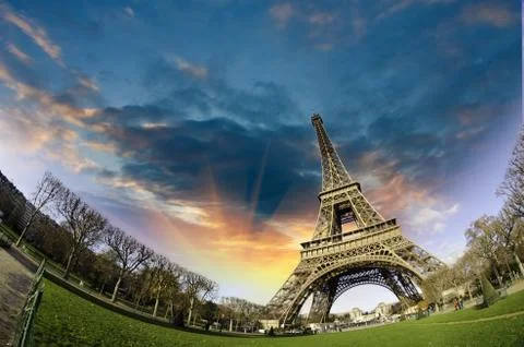 Sunset over Eiffel Tower from Champs de Mars Stock Photos
