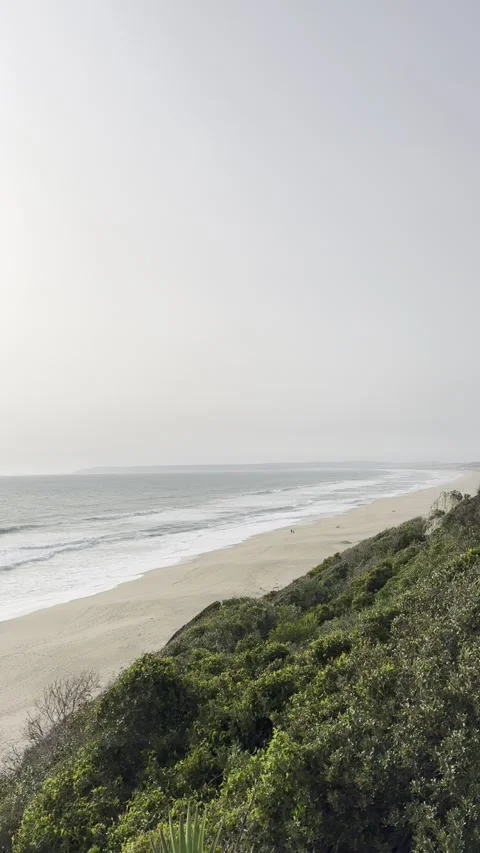 Sunset over the endless beach of Atlanterra by Tarifa in Spain Stock Footage 311643071