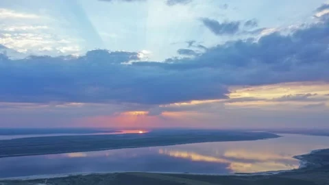 This is the sunset over the estuary. Video stock 135522136