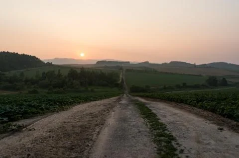 Sunset over the farm Stock Photos