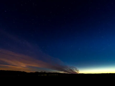 Sunset over the field with a barn. Stars appear. Time Lapse. 4x3 Stock Footage 23444053