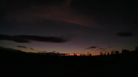 Sunset over a field in Chile Stock Footage 125077100