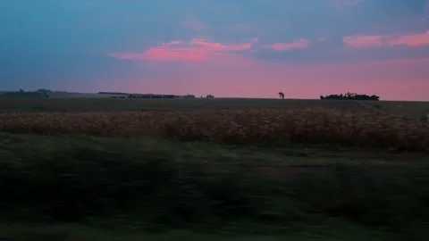 Sunset over the field Stock Footage 138068472