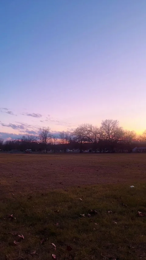 Sunset over a field Stock Footage 279523270
