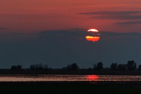 Sunset over a field Stock Photos