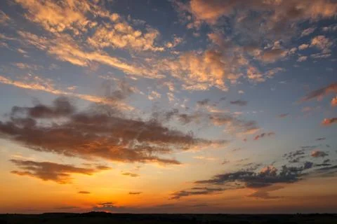 Sunset over the field Stock Photos