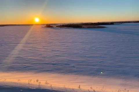 Sunset over the field Stock Photos