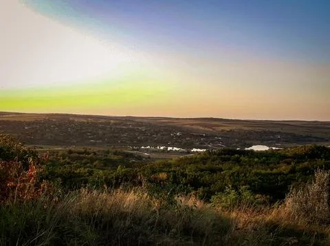 The sunset over the field Stock Photos