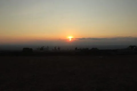 Sunset over the Field Stock Photos