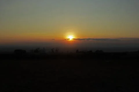 Sunset over the Field Stock Photos