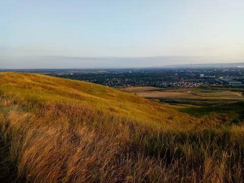 Sunset over the field in summer Stock Photos