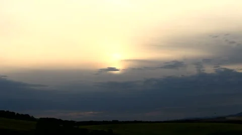 Sunset over field time-lapse Stock Footage 55548703