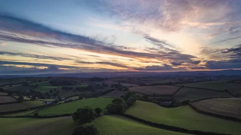 Sunset over Fields and Farmlands in HYPERLAPSE from a drone Stock Footage 209160297