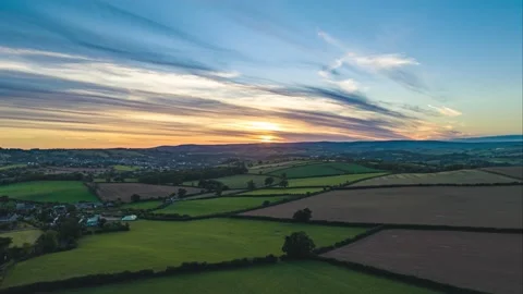 Sunset over Fields and Farmlands in HYPERLAPSE from a drone Vídeos de archivo 211102245