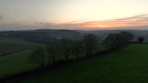 Sunset over Fields and Farms from a drone, Torquay, Devon, UK Stock Footage 221176795