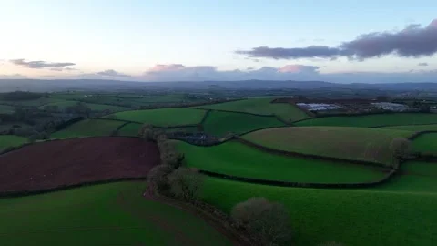 Sunset over Fields and Farms from a drone, Devon, UK 動画素材 229549277