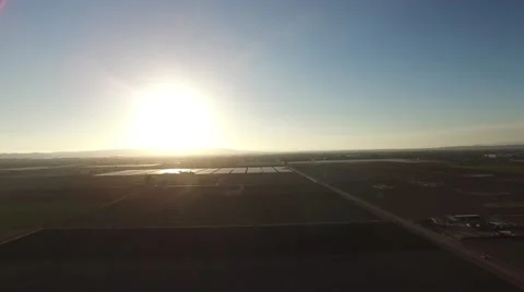 Sunset over Fields and a Small City Video stock 68750994