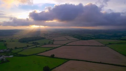 Sunset over the fields from a drone, Berry Pomeroy Village in Devon Stock Footage 161703318