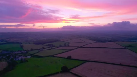 Sunset over the fields from a drone, Berry Pomeroy Village in Devon, England Stock-Footage 162047671