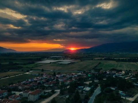 Sunset over fields Stock Photos