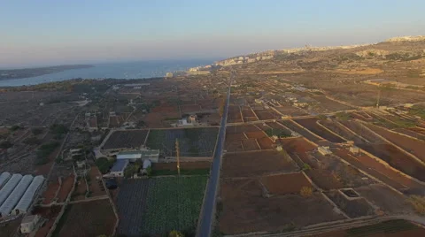 Sunset over fields sea and landscape Stock Footage 66261050
