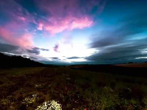 Sunset over the fields in Time Lapse Movie. Stock Footage 138504106