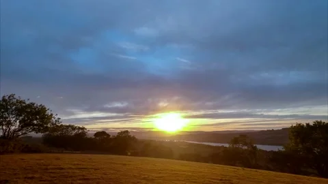 Sunset over the fields in Time Lapse Movie. Vídeos de archivo 138504515