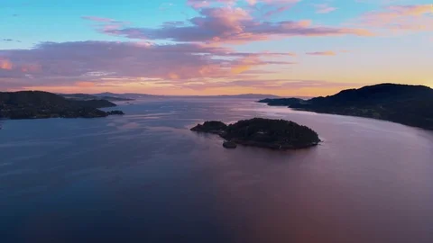 Sunset over fjord island Stock Footage