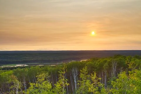 Sunset over a forest 스톡 사진
